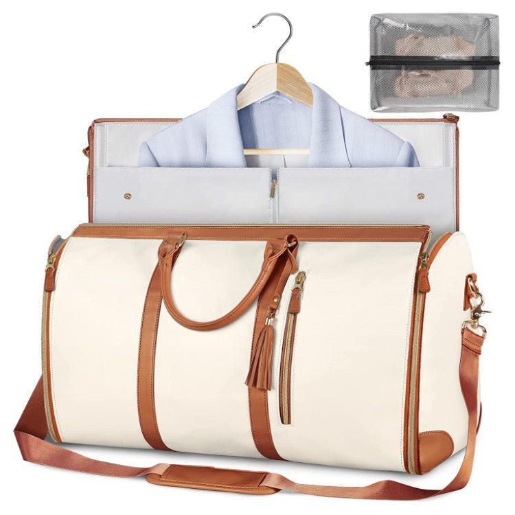 Foldable beige duffle bag with zip top, brown trim, and two front side pockets