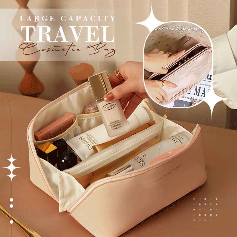 Cream large travel cosmetic bag opened to show compartments for skincare and makeup