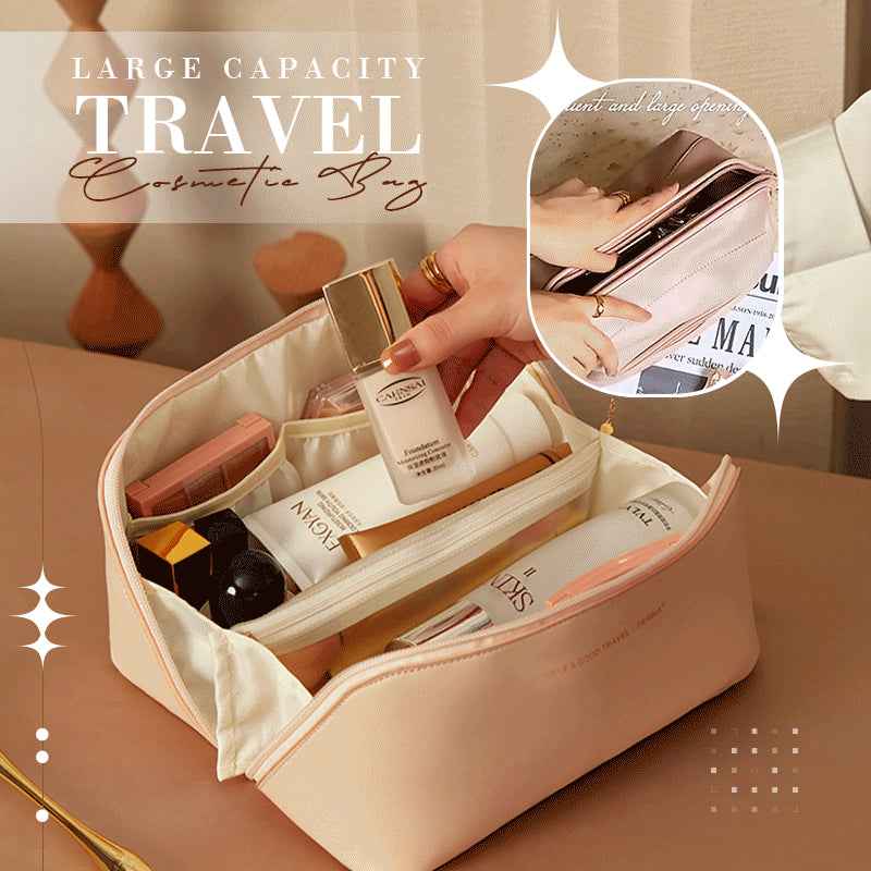 Cream large travel cosmetic bag opened with zip top and inner compartments for toiletries