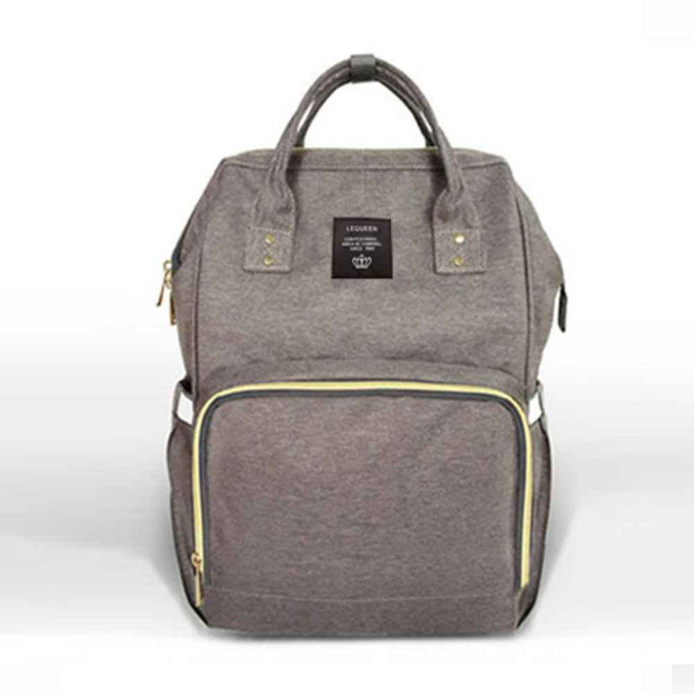 Gray maternity diaper bag with front zip pocket and top carry handles