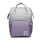 Gray maternity diaper bag with white stripes and purple front pocket, top handle and straps