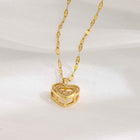 Gold heart pendant necklace with heart locket charm and clear stones on chain