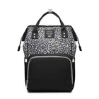 Maternity diaper bag with leopard print top and black front, two side pockets, zipper opening