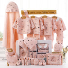 Pink newborn cotton clothing set with long-sleeve tops, pants, bibs, socks, and blanket