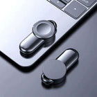 Wireless watch charger dock with magnetic plates in black and silver, close-up angle