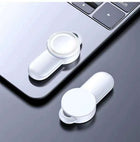 White wireless watch charger dock with magnetic circular charging plate, angled view