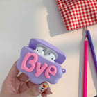 Purple silicone cloud AirPods case with “Bye” lettering, earbuds visible in the open lid