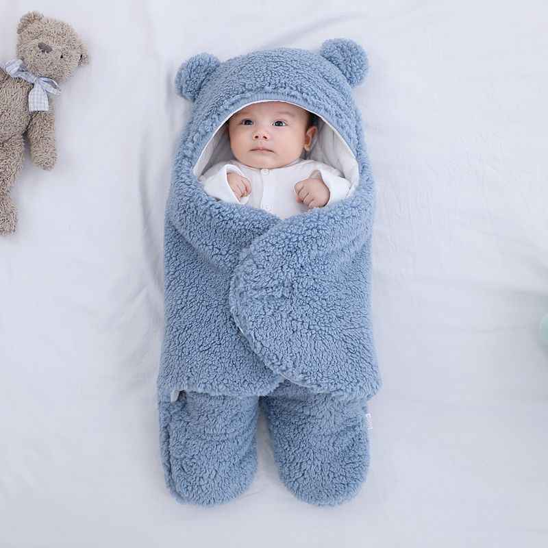 Light blue quilted baby sleeping bag with hood wrap, teddy-bear ears, footed pants