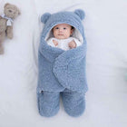 Light blue quilted baby sleeping bag with hood wrap, teddy-bear ears, footed pants