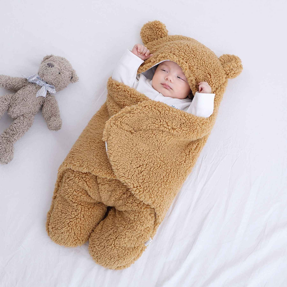 Tan quilted baby sleeping bag with hood and teddy-bear ear cap, cozy footed set