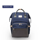 Navy blue and gray maternity diaper bag with front mesh pocket and dual zippers