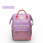 Purple and smoke pink maternity diaper bag with front mesh pocket and zip compartments