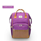 Purple and yellow maternity diaper bag with front mesh pocket and gold-tone zippers