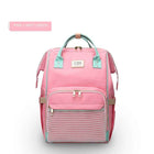 Pink and mint green maternity diaper bag with front mesh pocket and double front zips