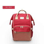 Red and beige maternity diaper bag with front mesh pocket and top handle