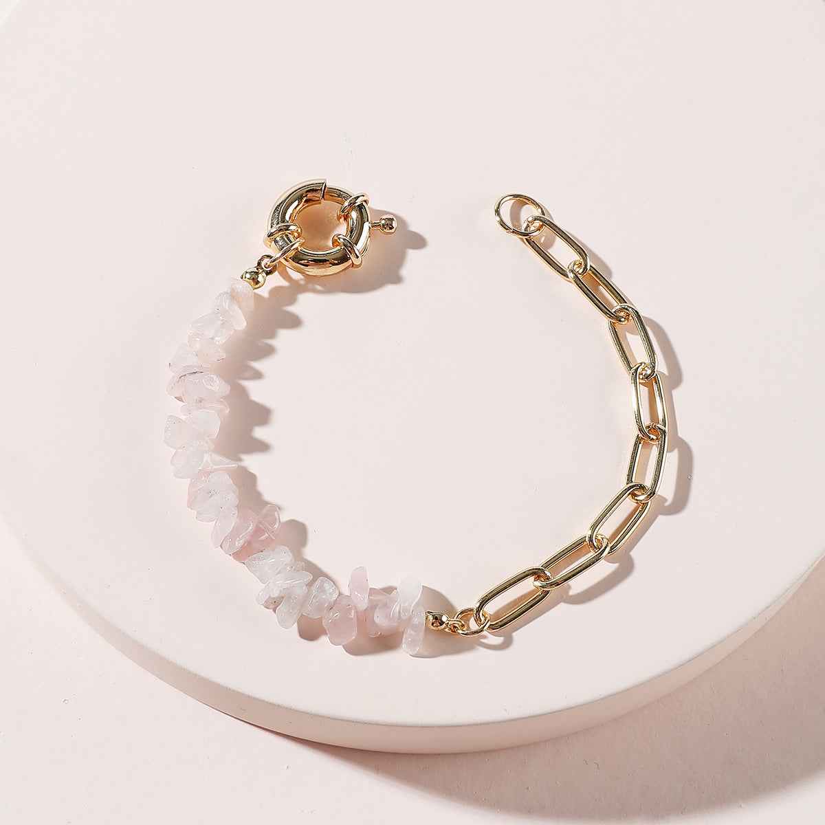 Clear crystal bead bracelet on a gold chain with a spring clasp