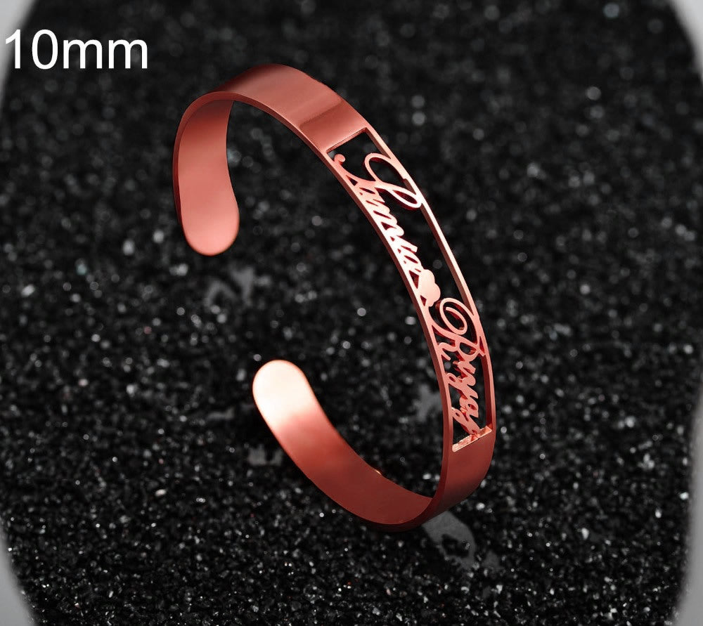 Personalized engraved stainless steel bangle bracelet, rose gold-tone, wide cuff with name engraving