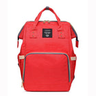 Maternity diaper bag in bright red with front zipper pocket and black-trim interior panel