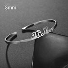 Personalized engraved stainless steel bangle bracelet, silver-tone with heart charm detail
