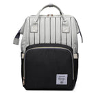 Gray and black maternity diaper bag with striped top and front zip pocket