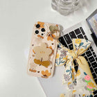 Floral bow phone case with ring and long floral ribbon bow, bear-and-flower print