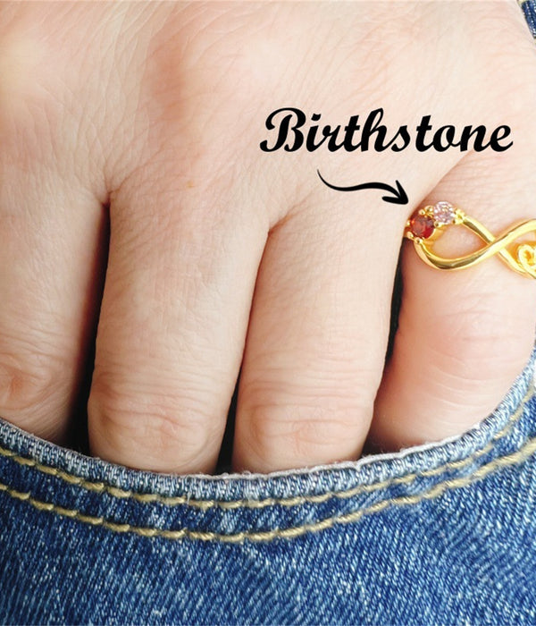 Gold-tone infinity knot ring with round multicolor gemstones, slim band