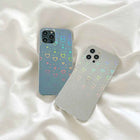 Transparent blue and cream iPhone cases with rainbow heart pattern, visible camera openings