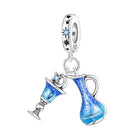 Blue magical pot charm bead pendant with stars and sparkly enamel, silver frame