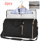 Large foldable waterproof duffle bag, black with front pocket, zipper pull, and strap