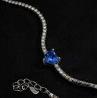 Silver-tone zircon bracelet with blue heart-shaped stone and chain links