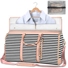 Foldable black-and-white striped duffle bag with pink trim, zip opening, and tassel details