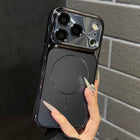 Dark phone case with silver-toned border and raised camera lens guard