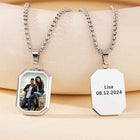 Silver-tone mood necklace with photo octagon and white nameplate reading Lisa 08.12.2024