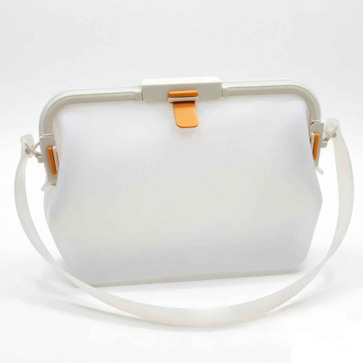 Waterproof silicone pouch in white with flip-top clasp and white shoulder strap