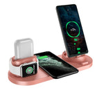 6-in-1 wireless charging station, pink base with phone, watch, and earbuds charging docks