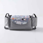 Grey animal-print stroller organizer with three compartments and handle straps