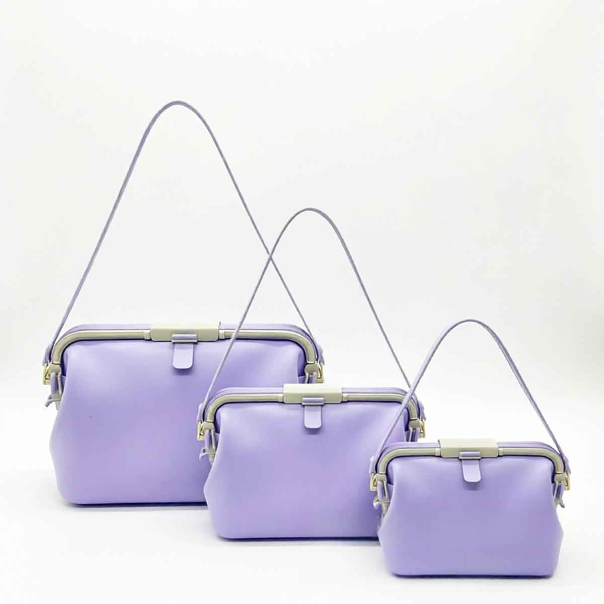 Waterproof silicone pouch set in lavender purple with flip-top clasp and shoulder straps
