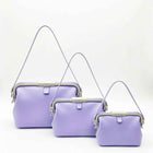 Waterproof silicone pouch set in lavender purple with flip-top clasp and shoulder straps