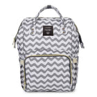 Gray wavy print maternity diaper bag with front zip pocket and black side panels, top handle