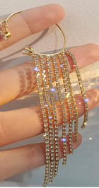 Gold hoop earrings with rhinestone tassel fringe strands