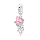 Pink and silver dessert bow charm bead with dangling hearts and crystal accents.