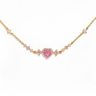 Gold chain bracelet with pink heart center and small pink rhinestone links