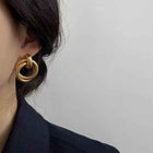 Gold statement hoop earrings with double circular metal links
