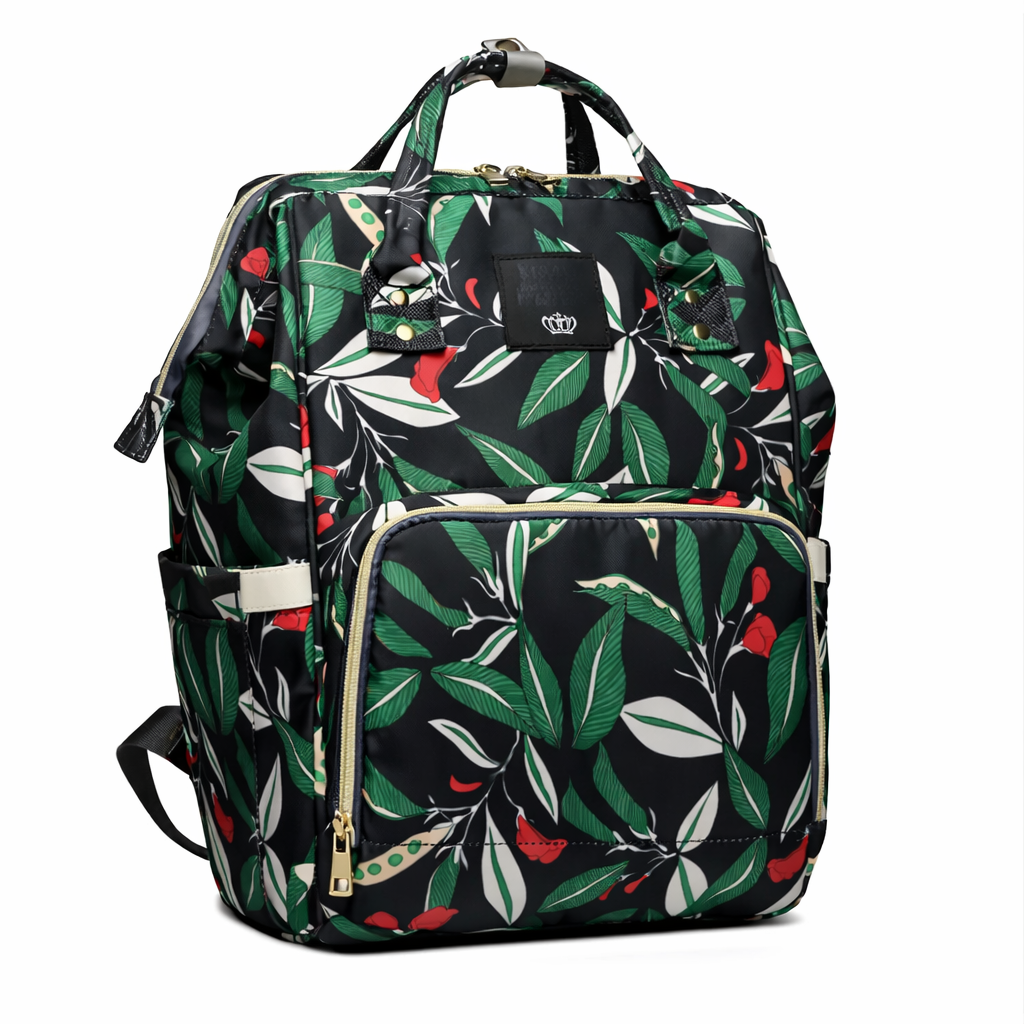 Green and black leaf-print diaper backpack with front zip pocket and top handles