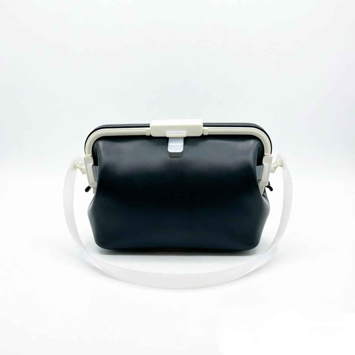 Waterproof silicone pouch in dark gray/black with flip-top clasp and shoulder strap