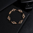 Rhinestone heart charm bracelet with black stones and heart links with crystal accents