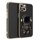 Black phone case with 3D astronaut charm, ring grip, and dual camera cutouts