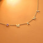 Gold initial necklace with pink round stone bead and letter charms M A
