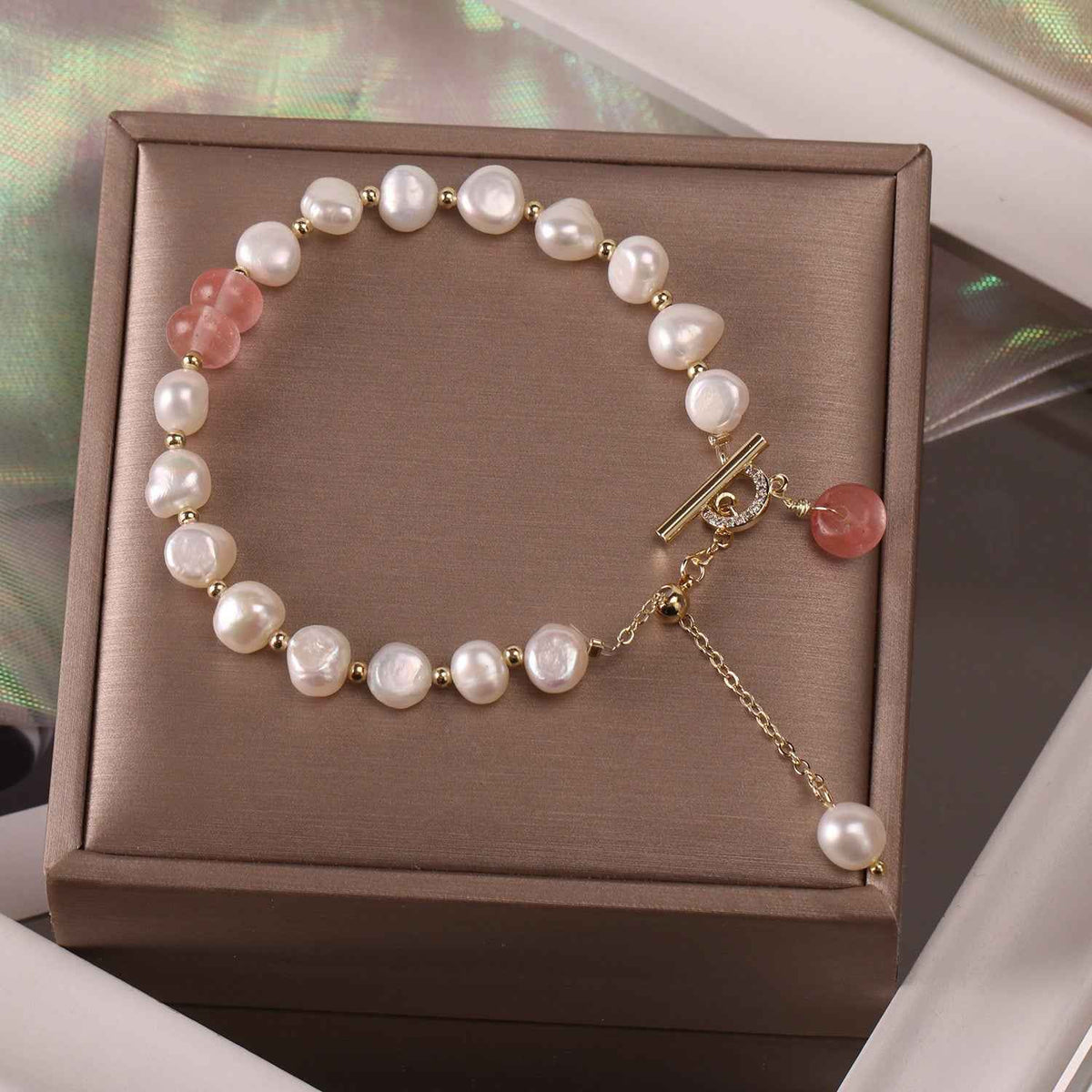 Freshwater pearl bracelet in gift box with white pearls and green and pink charm dangles