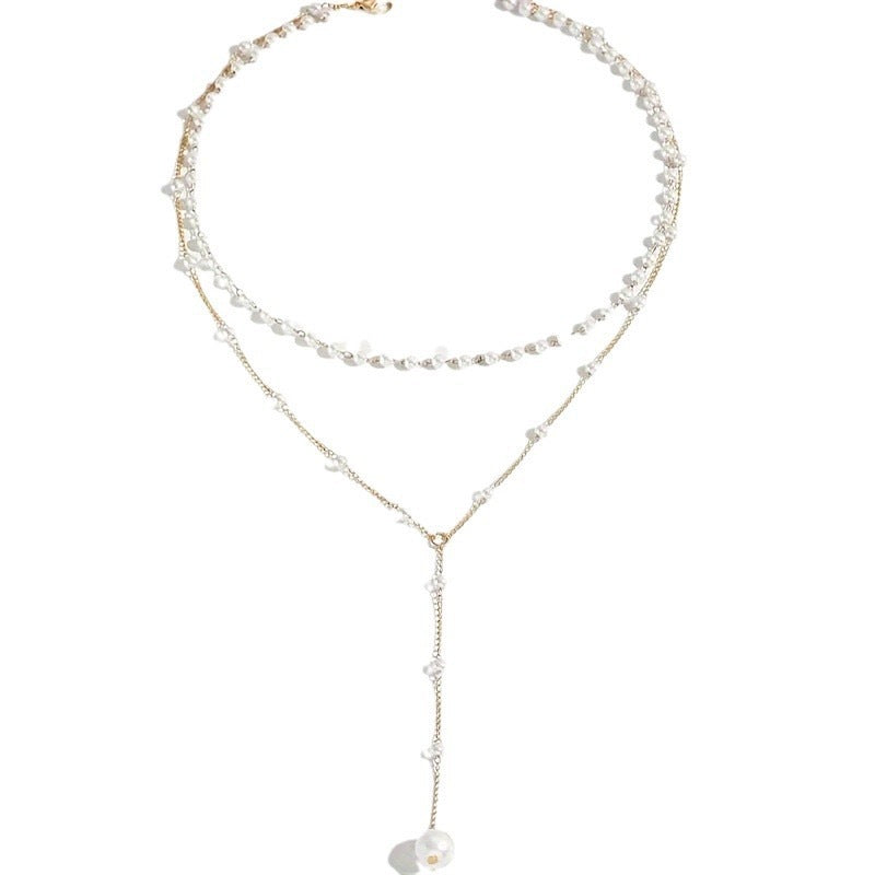 Double-layer pearl necklace with silver-tone chain, crystal-styled strands, and hanging pearl